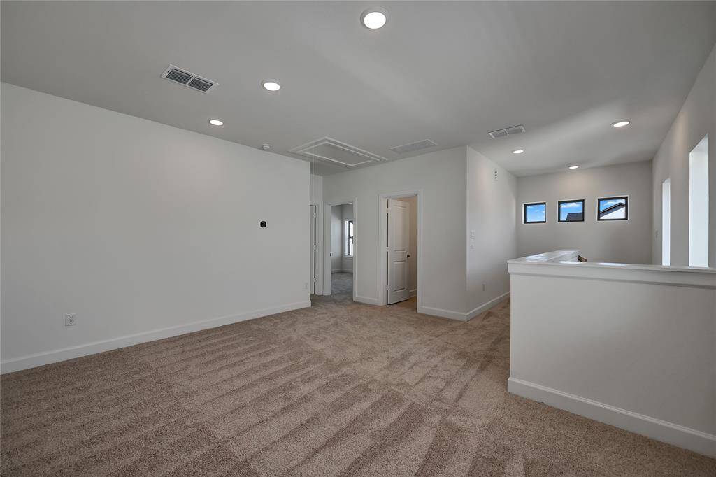 An additional view of thisGigantic Game Room thatoffers recessed lighting.