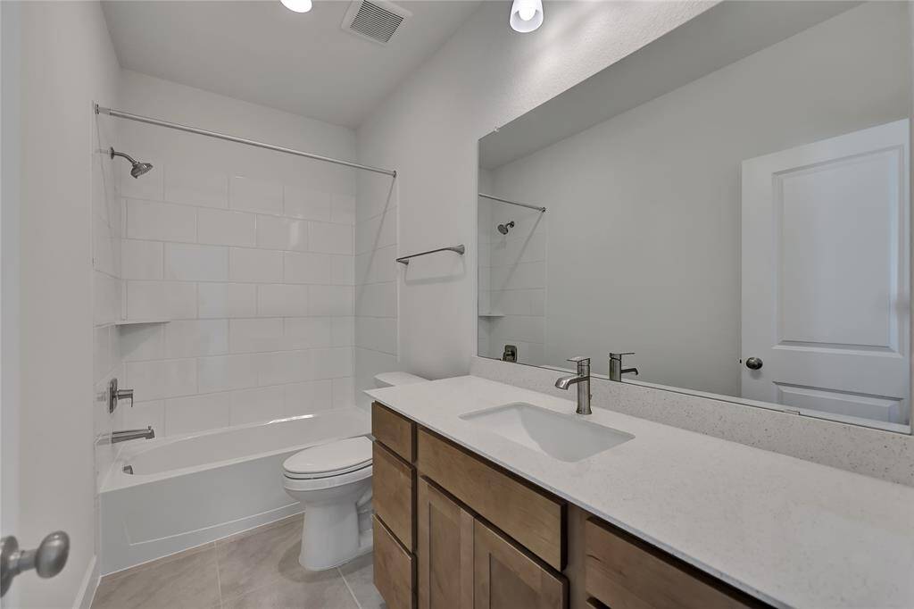 Fabulous secondary Full Bath withgorgeous cabinetry andshower/tub with tile surround.