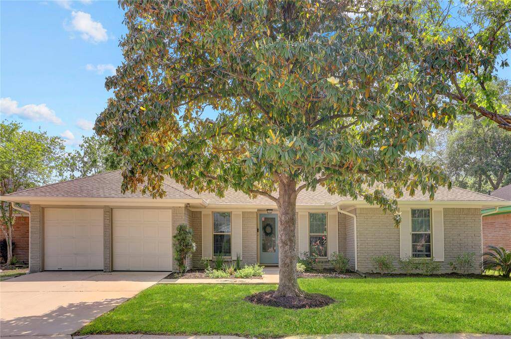 Another view of front with roof replaced in May 2022. Double-paned windows throughout! Great location with easy freeway access. Short drive to Medical Center or Galleria area.