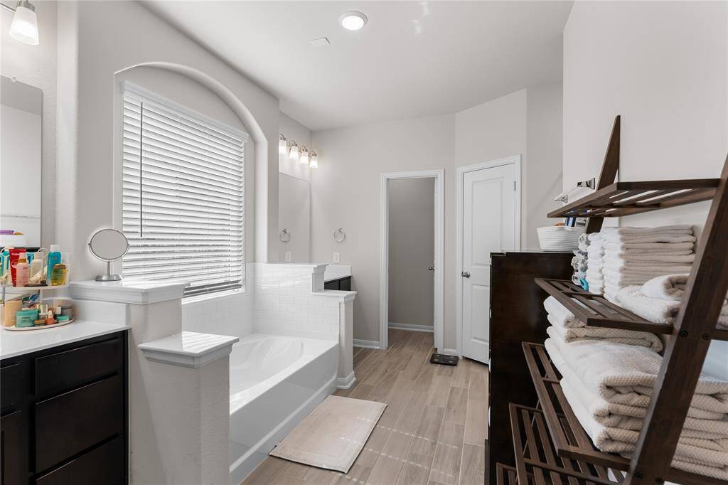 Primary bathroom with two closets