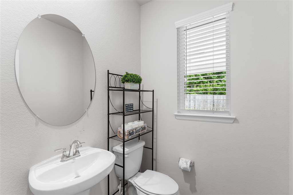Half bathroom located on the first floor