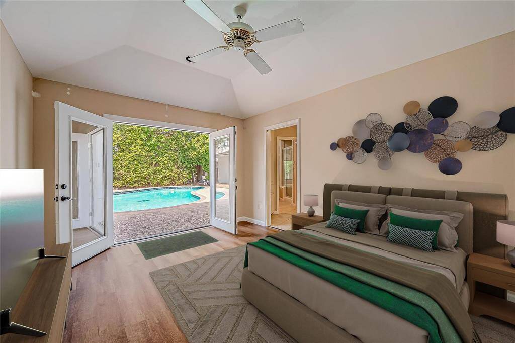 Just Image stepping into yourluxurious primary suite, wherethe first thing you see is yourprivate glistening pool.