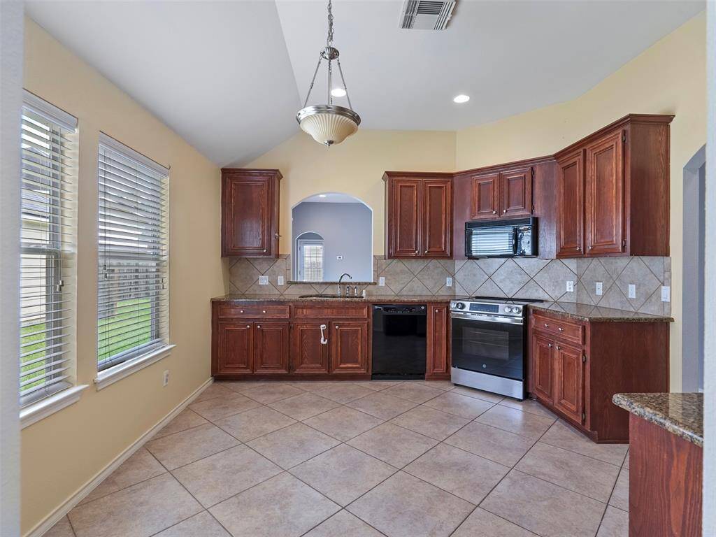 Kitchen with granite counter top