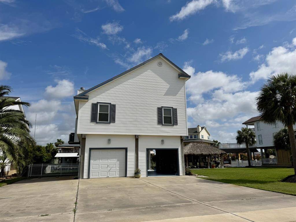 streetview of home with extra wide driveway