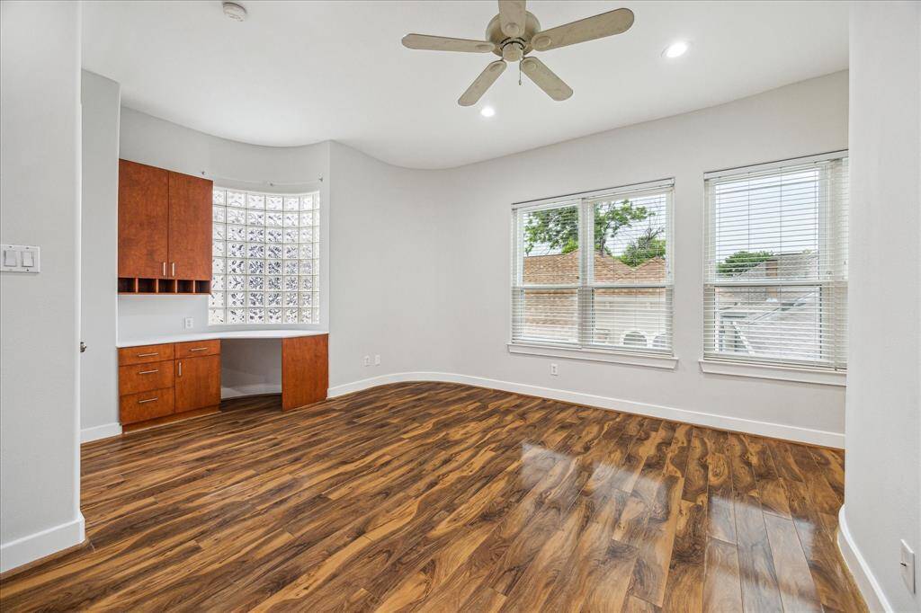 The primary bedroom also has a built in desk with lots of storage.
