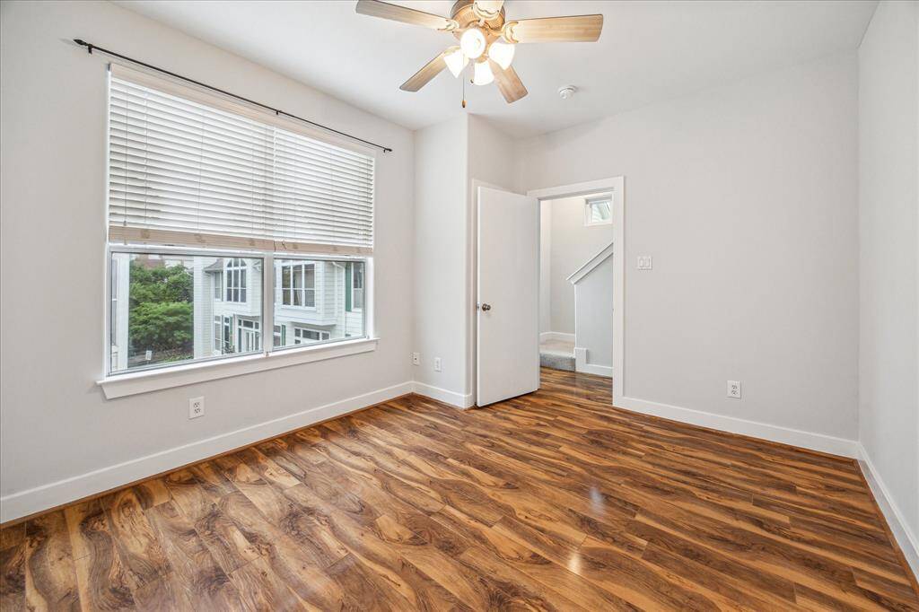 Nice sized secondary bedroom also with gleaming hardwoods, no carpet in the bedrooms!