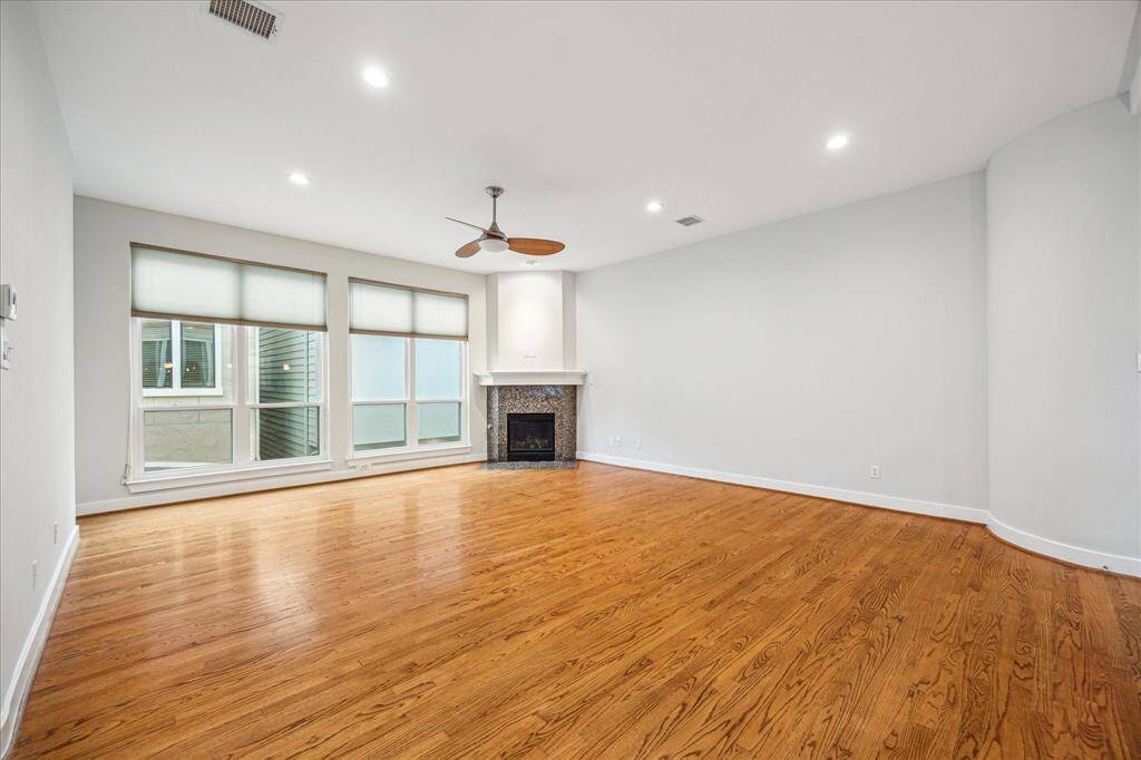 Lots of windows bring in an abundance of natural lighting. The living room also has a gas log fireplace with granite surround. Home just completely repainted and owner spent over 20K getting the home ready to sell.  The home shows so well.