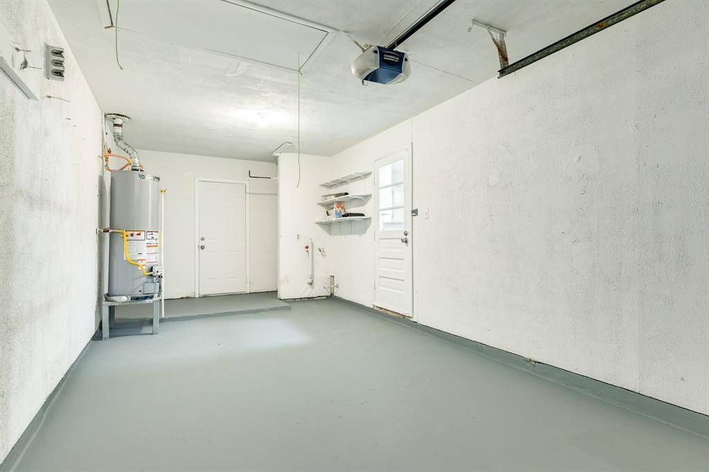 Garage space finished out for storage or parking.