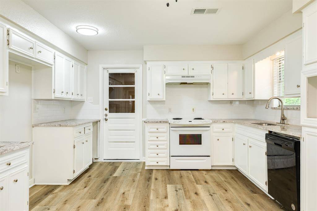 All new granite countertops to elevate the look of this kitchen.
