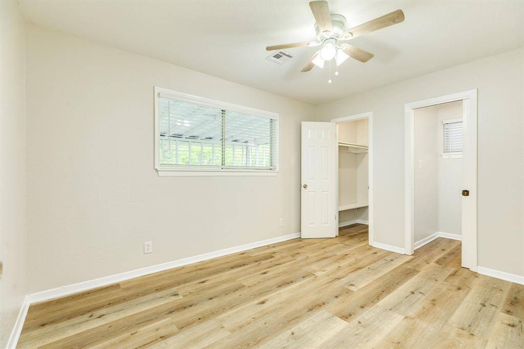 Primary bedroom offers a half bath for convienence.