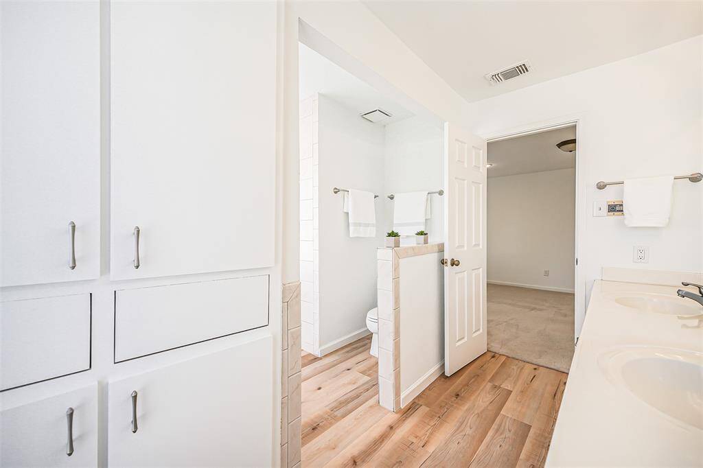 Alternate view of the Primary Bathroom Oasis with storage and more to enjoy as you wash the day away