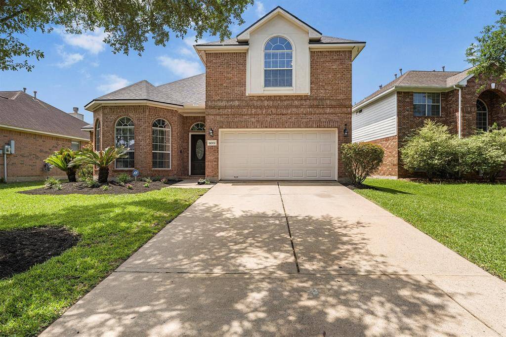 This home offers great curb appeal and plenty of off-street parking with a two-car attached garage and a spacious double-wide driveway perfect for guests or multi-driver households.