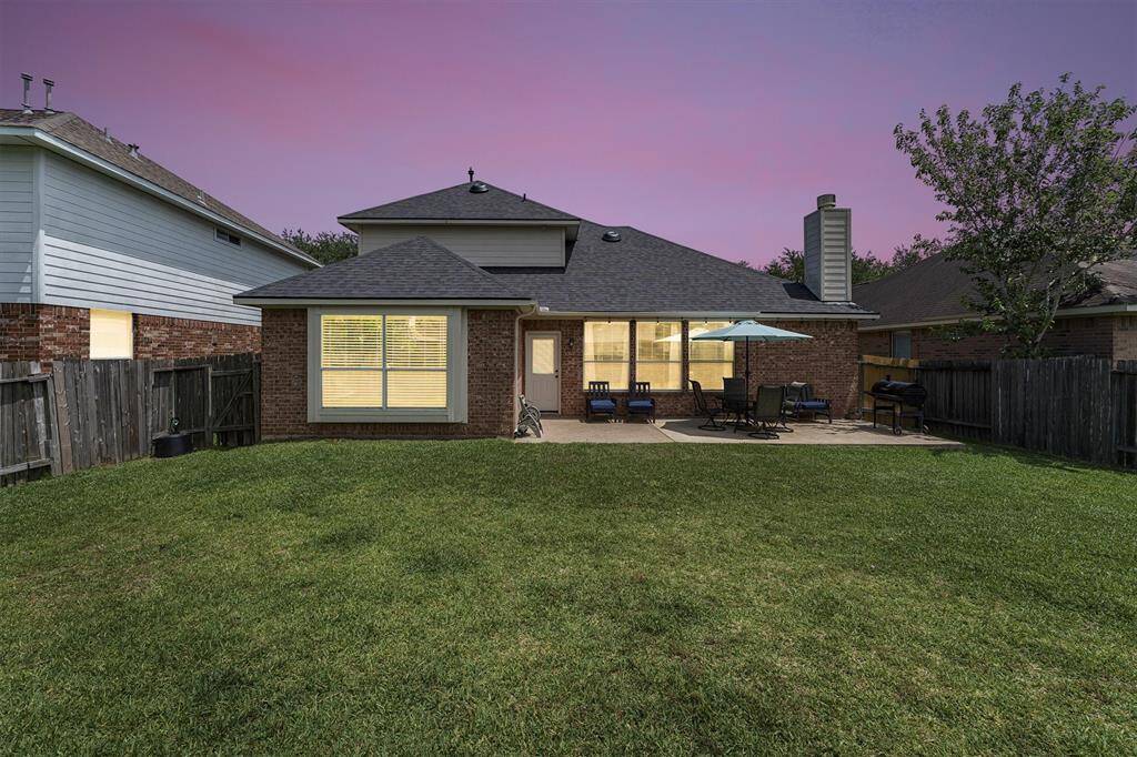 Enjoy evenings under the stars or weekend cookouts in this spacious backyard, complete with a large patio that’s perfect for grilling, dining, and relaxing with friends and family.