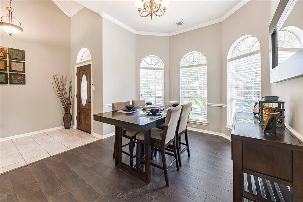 Gather them around your table to honor old traditions and create the new. This elegant formal dining room offers the perfect setting for everything from casual family meals to lavish dinner parties.