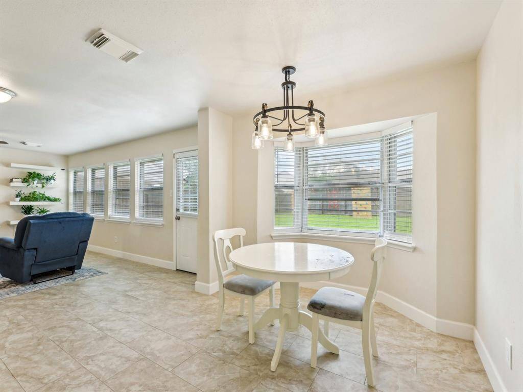 The Breakfast Nook has a terrific bay window that adds depth to this space.