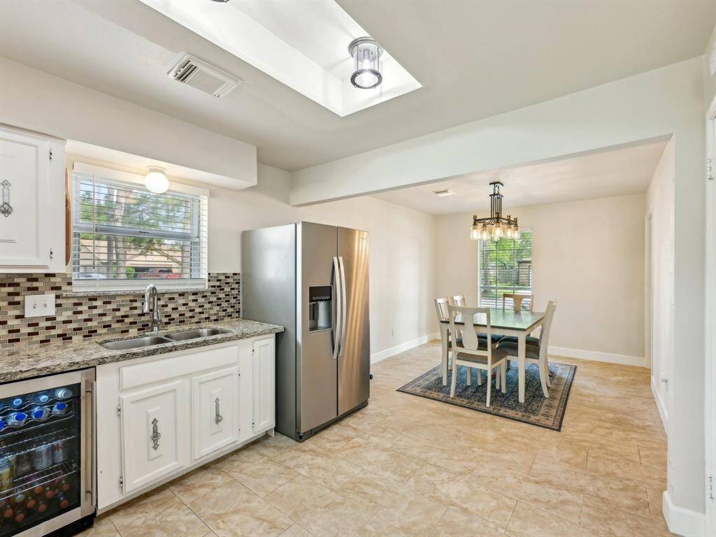 This Kitchen has been updated and has an awesome beverage chiller!