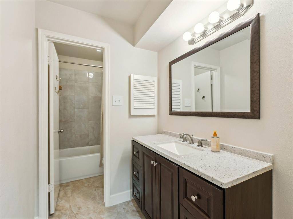 The hall bathroom is updated and has a great tub/shower combination.