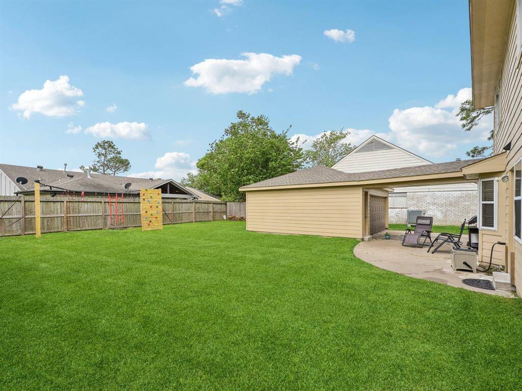 There is so much room in this backyard, it's perfect for tossing a ball or letting the furry friends loose.