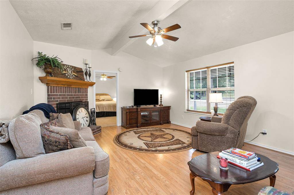 Living area with wood burning fireplace