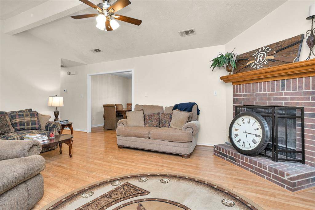 Living area with wood burning fireplace