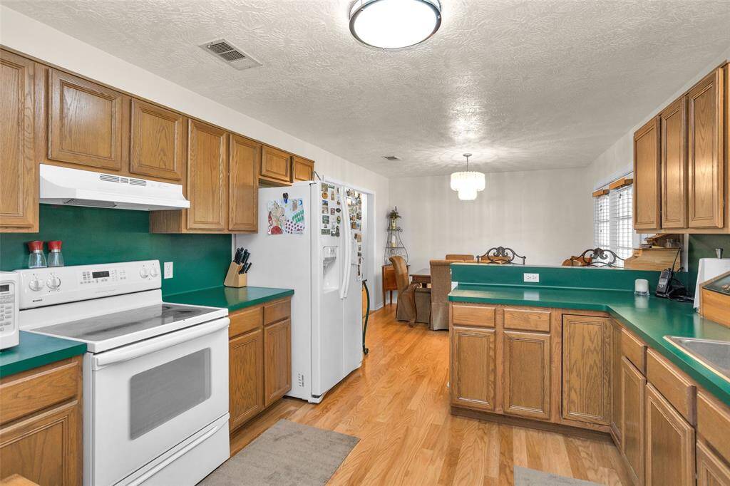 Breakfast area with double doors that open to the back patio