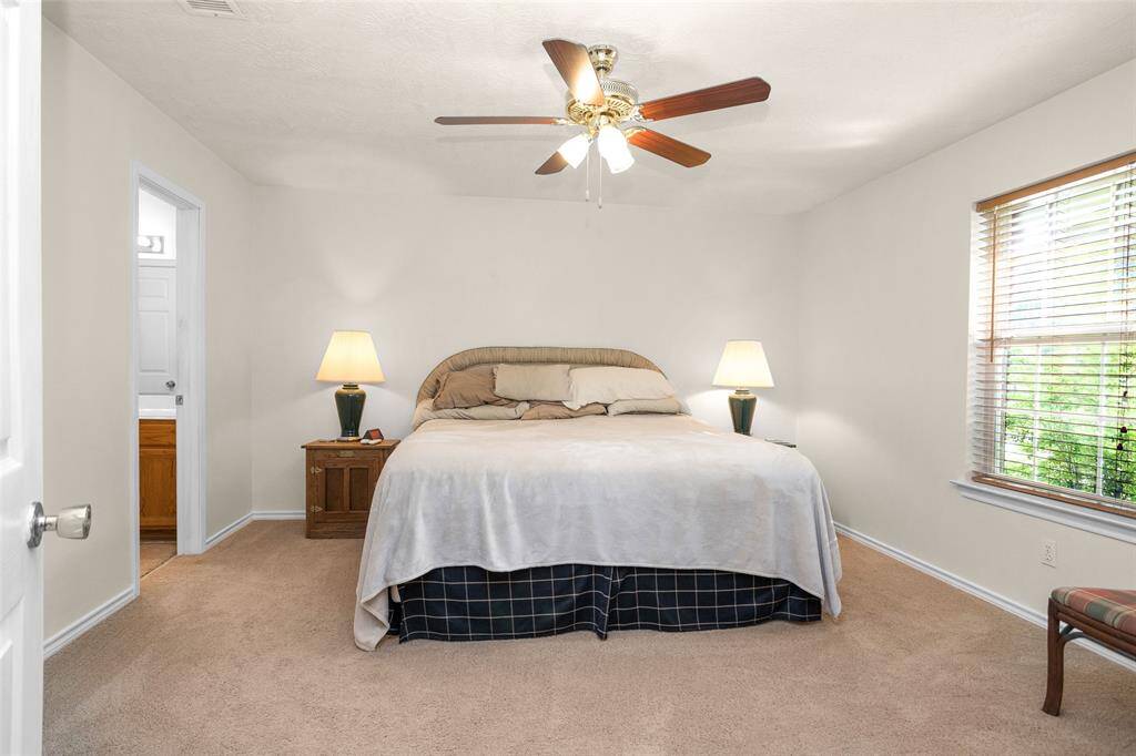 Primary bedroom with tons of natural light
