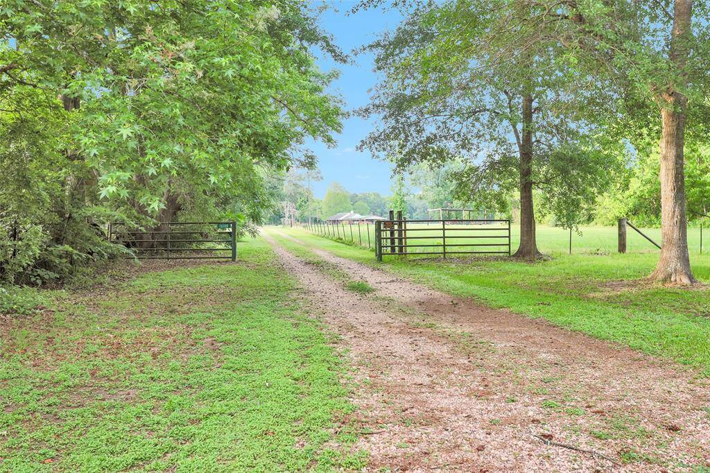 Secluded entrance to property with a gate