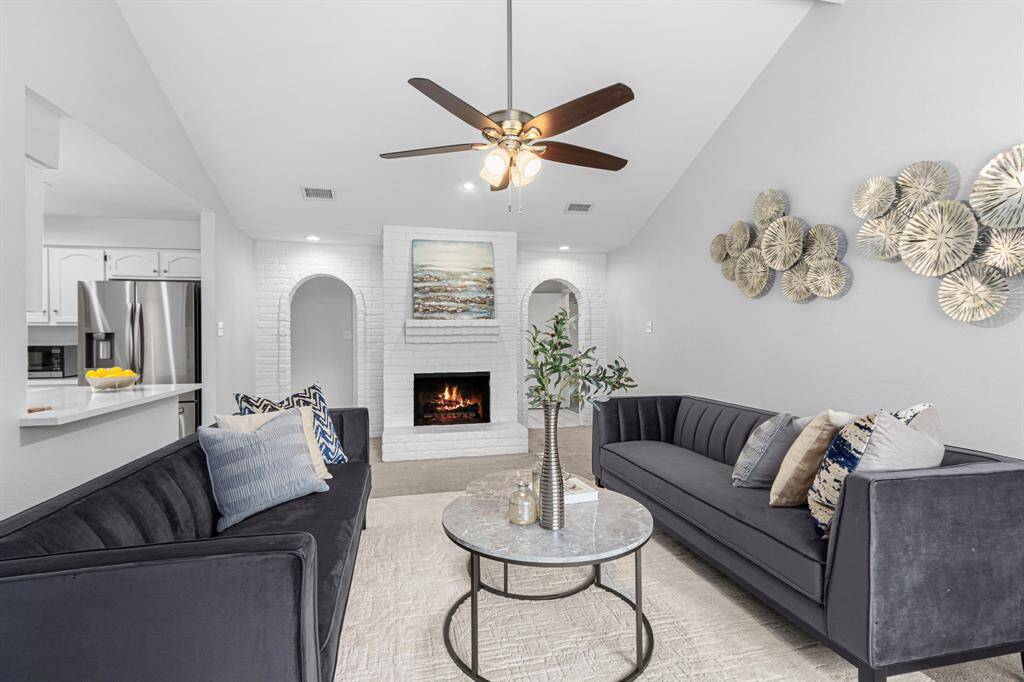 Comfy vibes with a wood burning fireplace, focal point