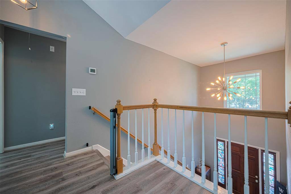 Lux Vinyl Plank flooring runs throughout the upstairs as well