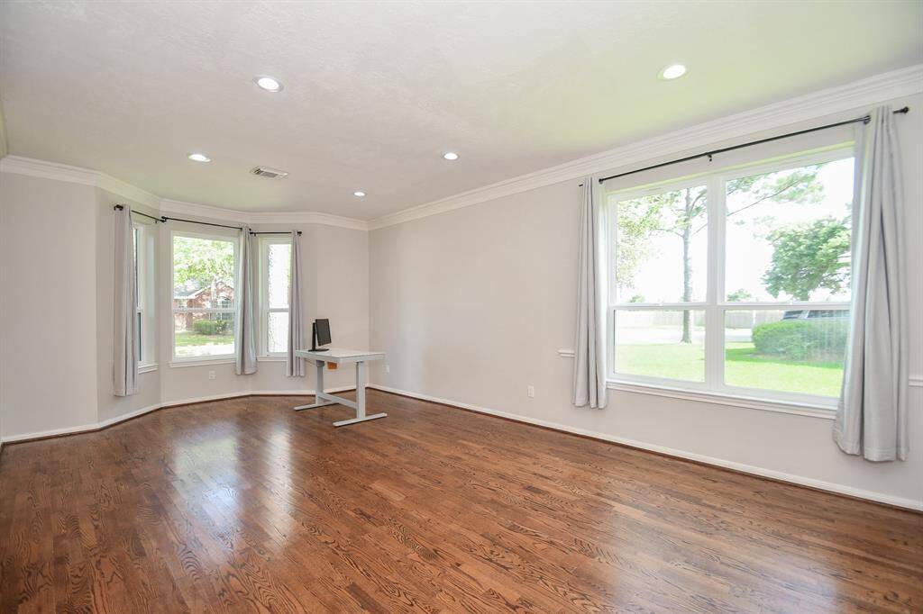 How you decide to furnish this large, shared space, your pieces will be bathed in glorious natural light. The bay windows are so inviting, creating a cozy intimate space.