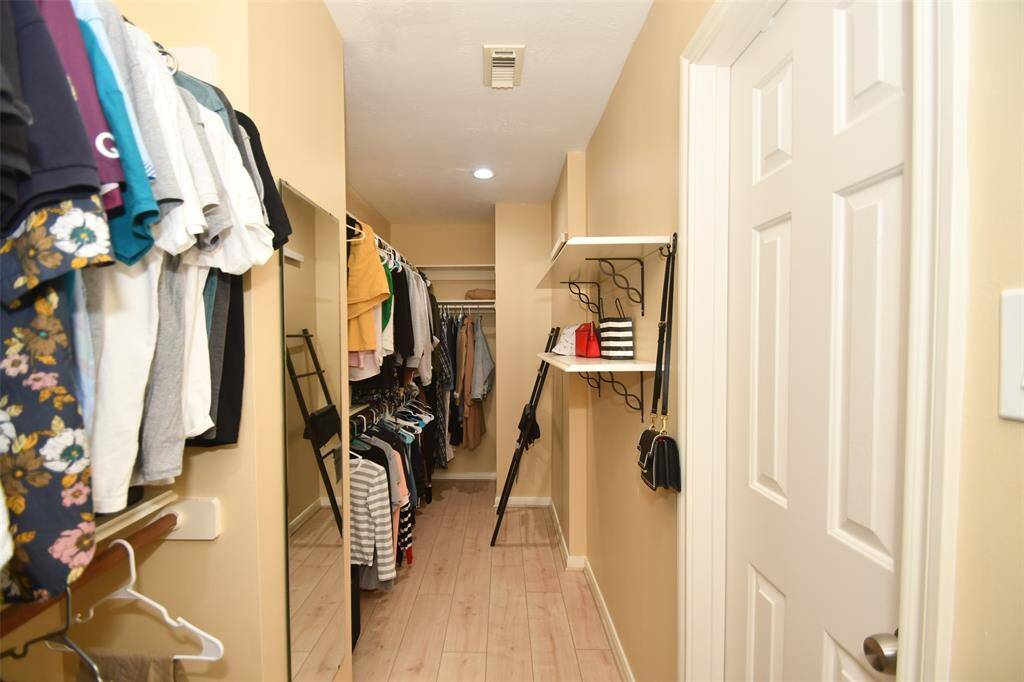 One can never have too many of these: your huge primary walk-in closet!