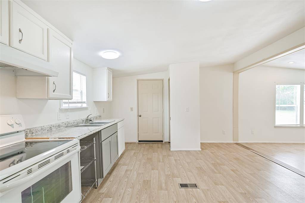 Kitchen with view to back/side door