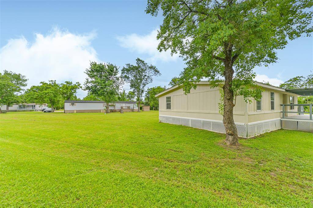 Side of home with view to back