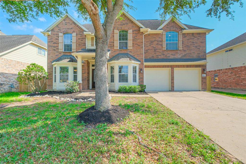 Grand Two-Story in Lakes of Pine Forest!