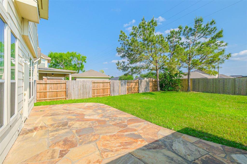 Look at that gorgeous stone patio!!