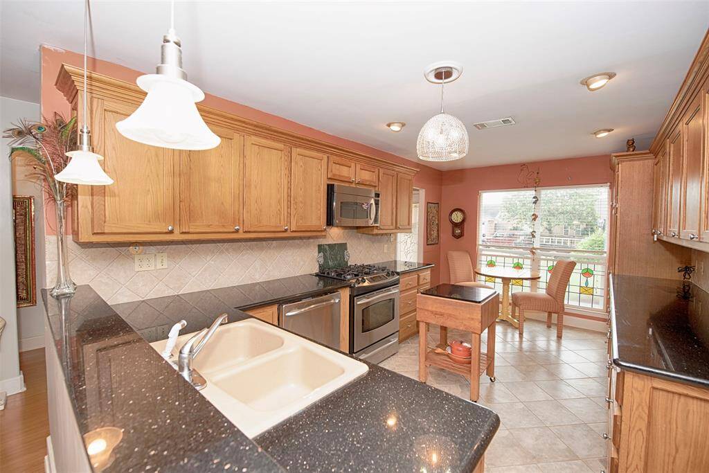 A view of the kitchen as you approach the family room.