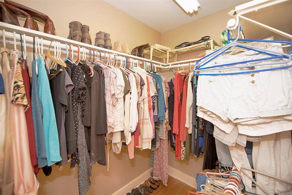 The primary bedroom provides not one, but two walk in closets.