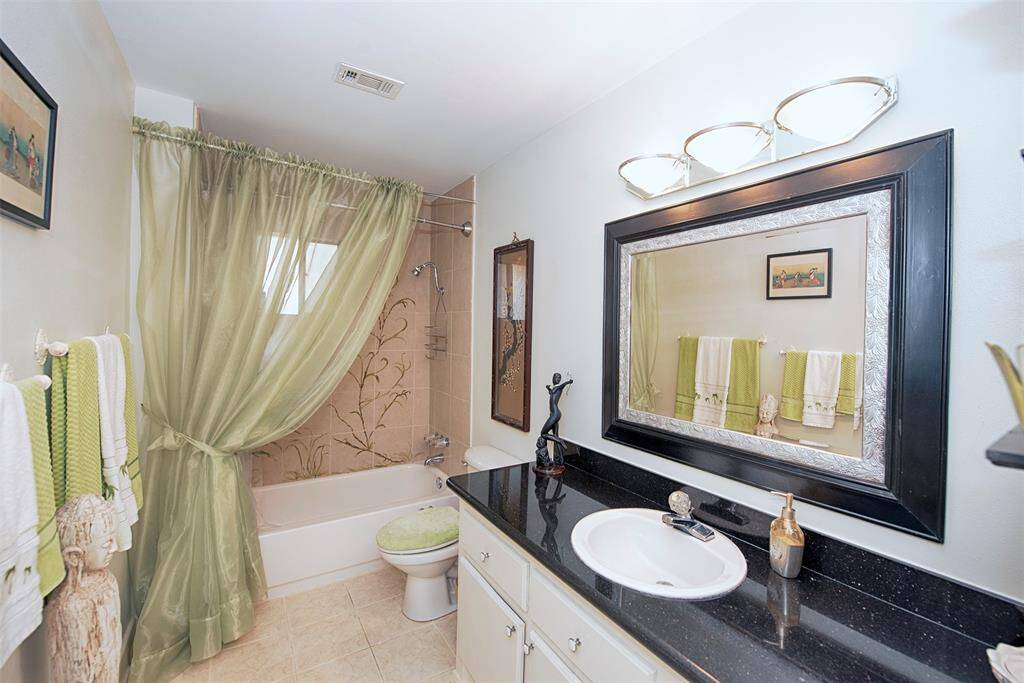 Amazing updated bathroom with huge vanity.
