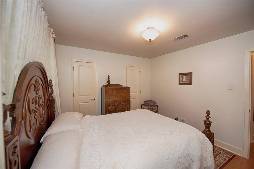 A view of the room showing not just one but two closets.