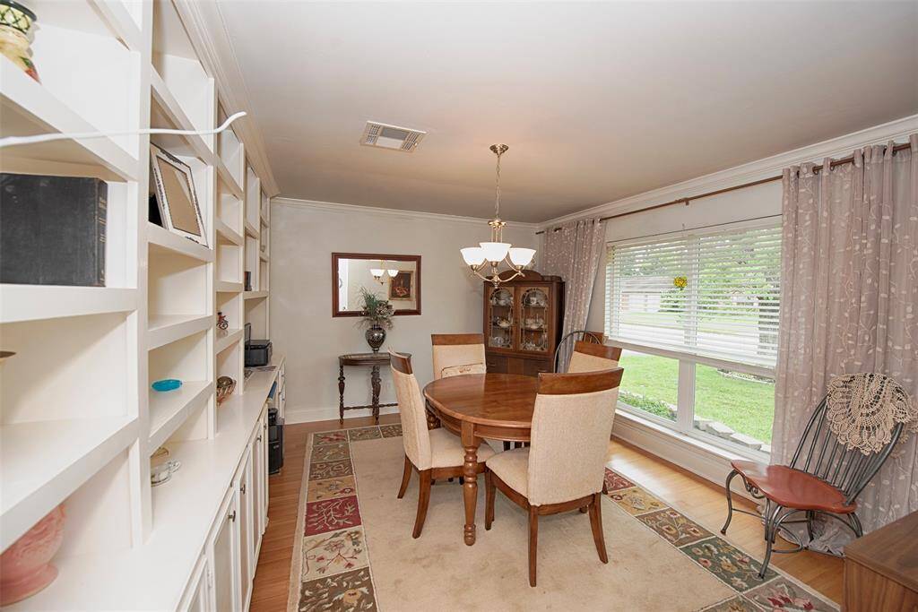 Upon entry to the home is a spacious formal dining room.