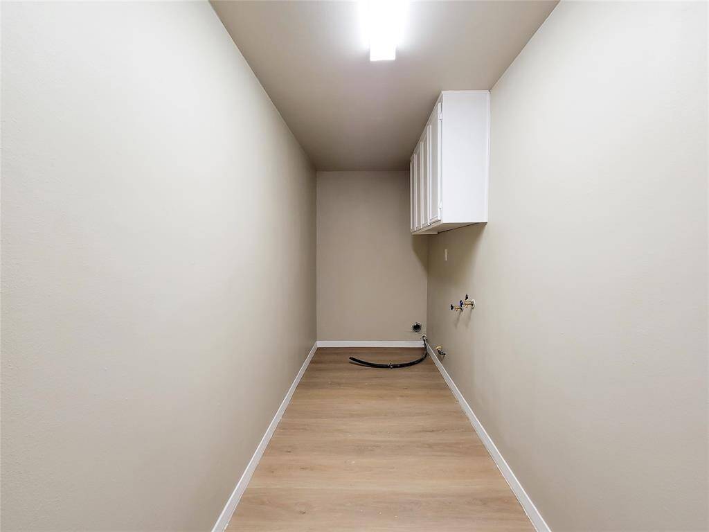 extra large laundry room with enough space for additional freezer and fridge plus and washer and dryer
