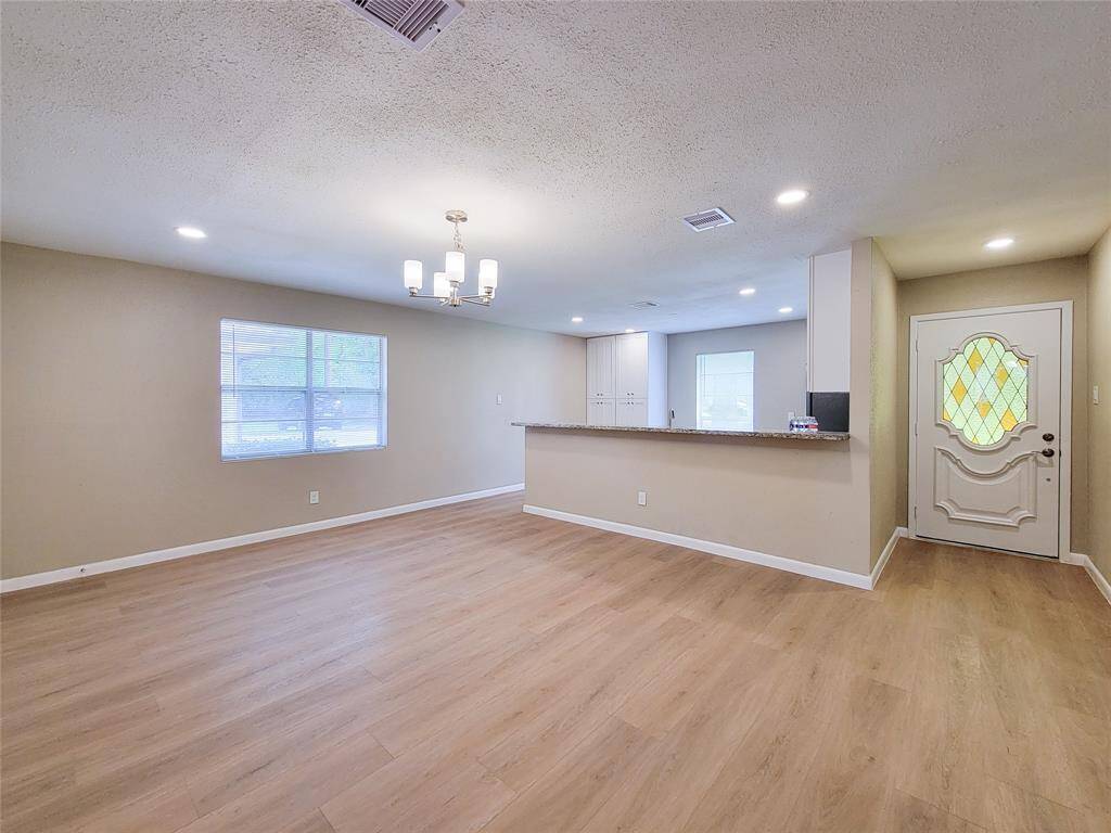open concept dining room to the kitchen