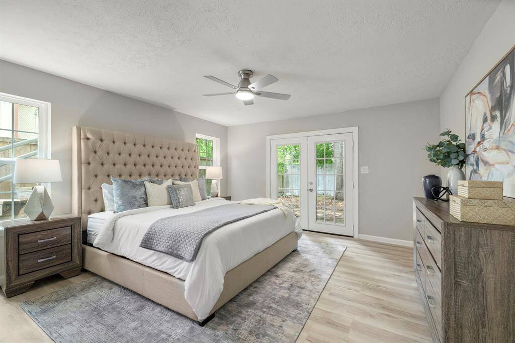 ... with French doors leading to the rear patio