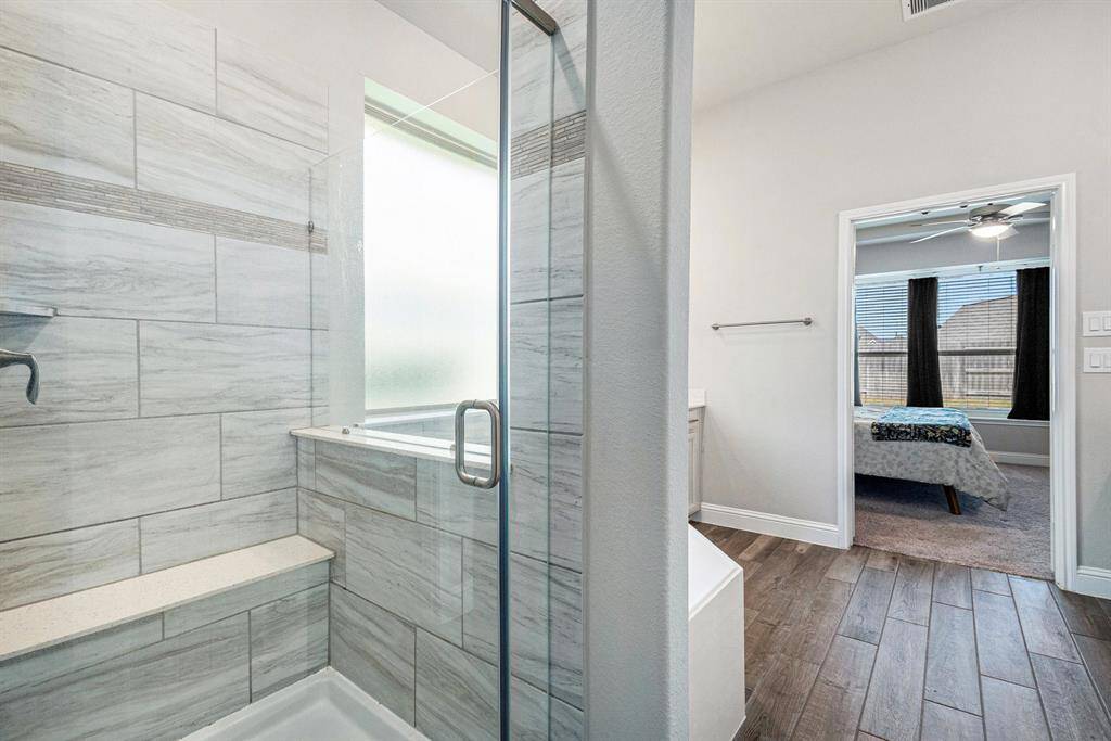View of the stunning glass standing shower!