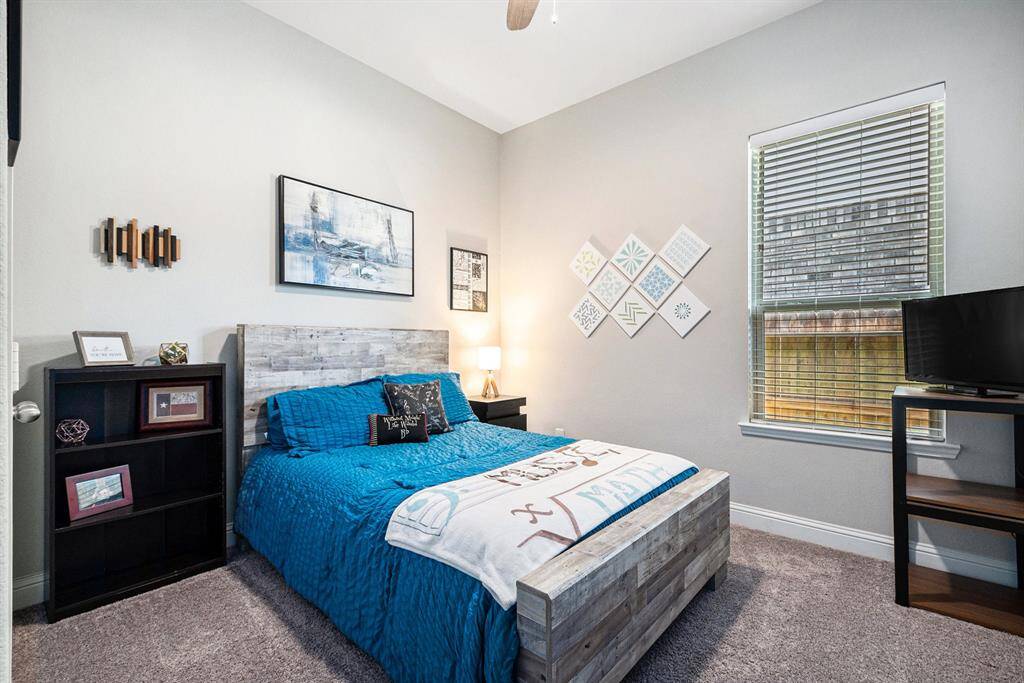 Spacious secondary bedroom off the entry.
