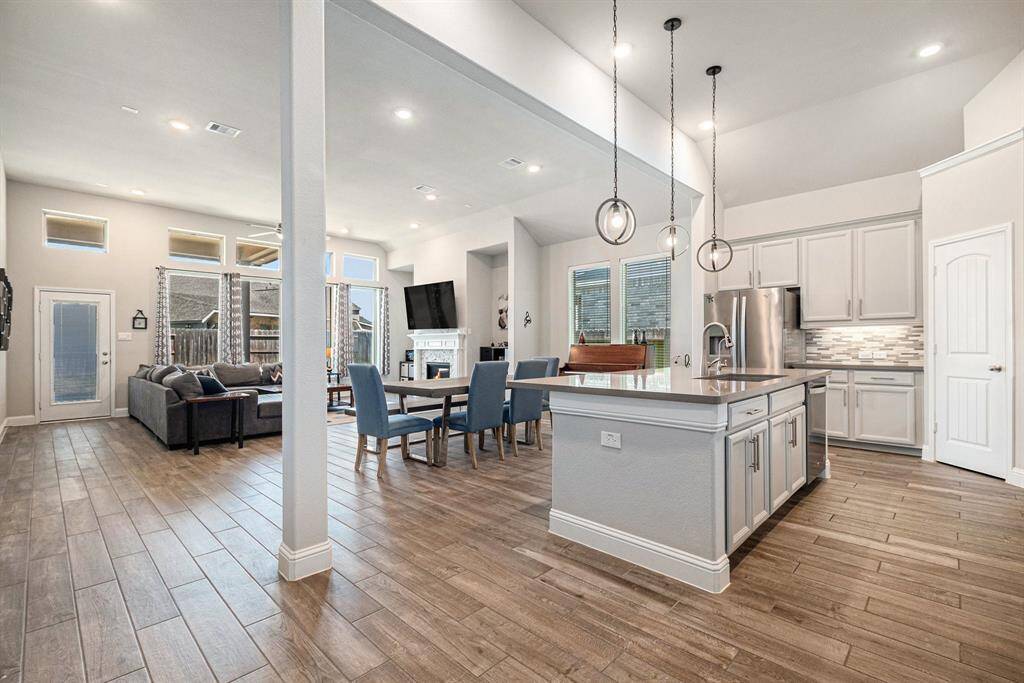 This spectacular open floor plan features a seamless flow from the kitchen to the living room, creating the perfect space for entertaining and everyday living!