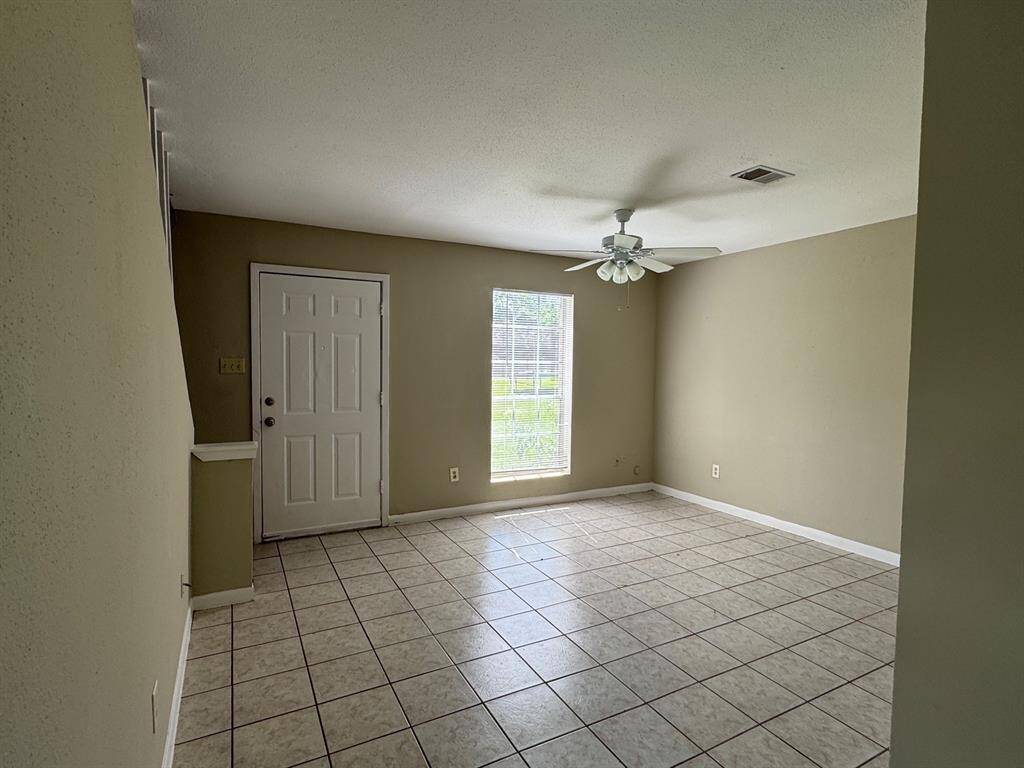 Another view of the spacious family room with abundant natural light!
