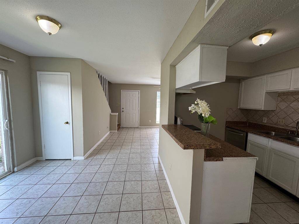 The beautiful kitchen opens to the dining room and family room, perfect for relaxing and enjoyable family time!