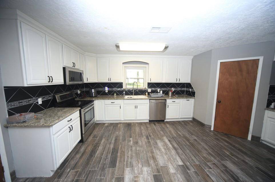 Main House - Kitchen - Purchase includes 2 Houses and about 2 Acres of Land