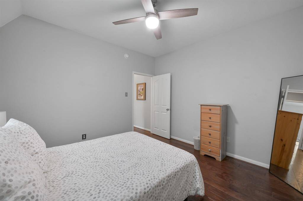 Bedroom 2 leads to hallway and full-size tub/shower bathroom.